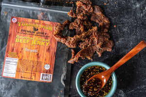 A photo showcasing the bursting flavors of Teriyaki Brisket Beef Jerky